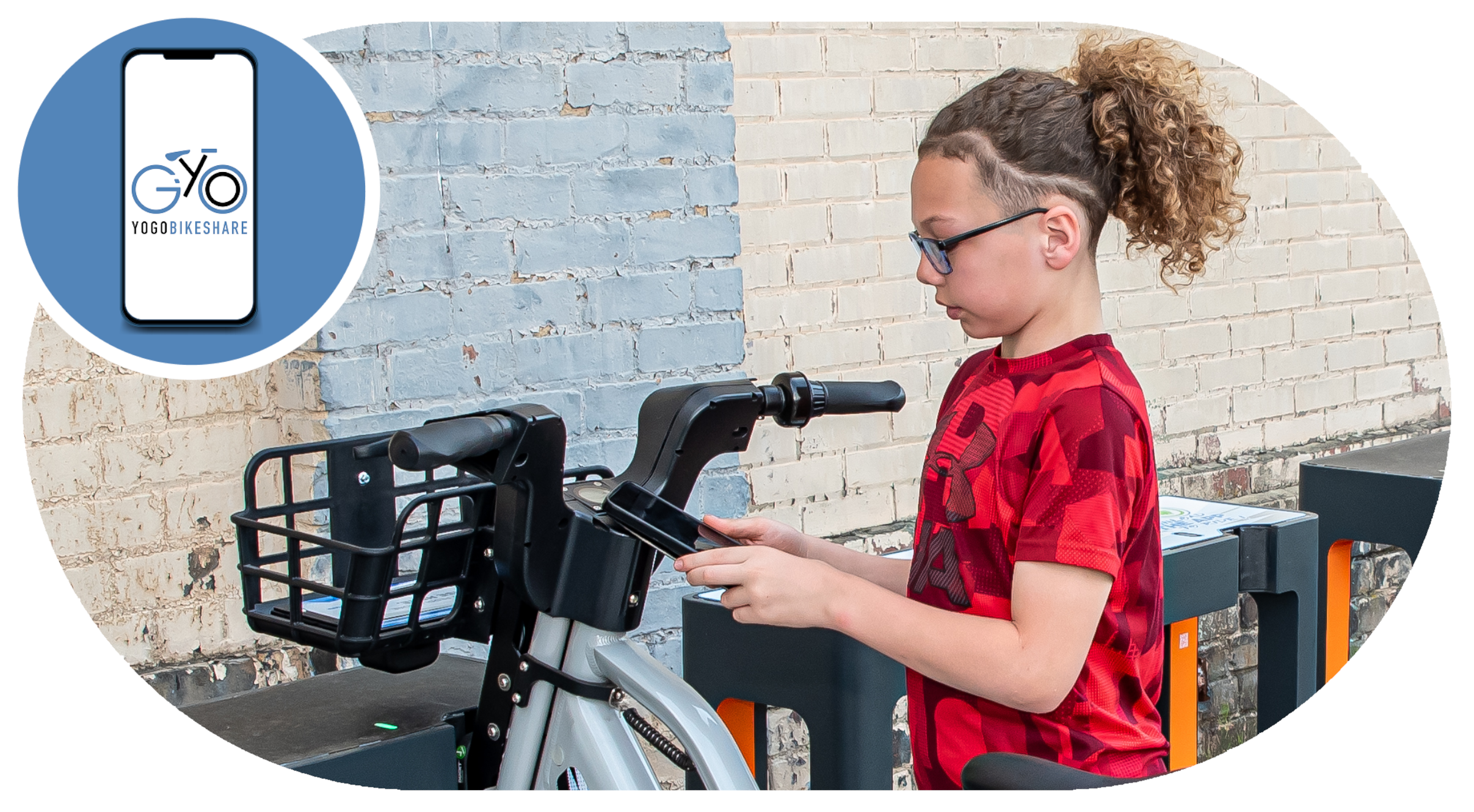 A young child in a red shirt preparing to ride an e-bike
